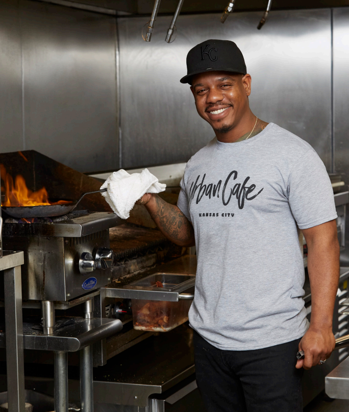 Image of: Chef Justin Clark of Urban Cafe cooking in his restaurant