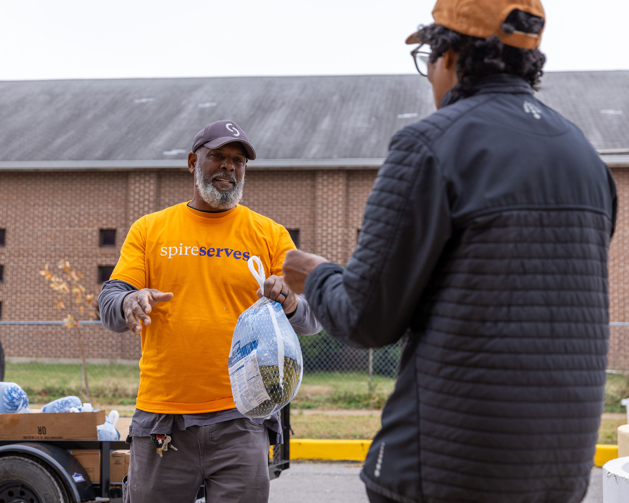 Spire employees at Thanksgiving Essentials Drive 