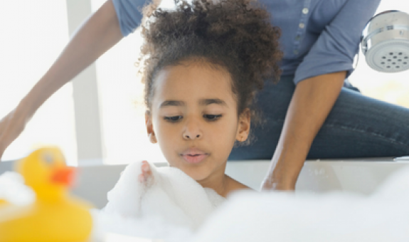 Girl enjoying bubble bath