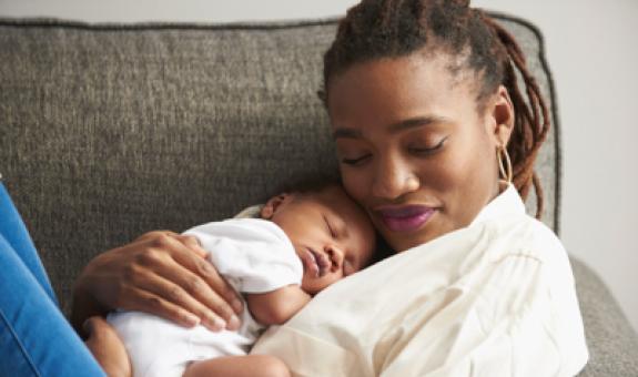 Image of mother holding baby