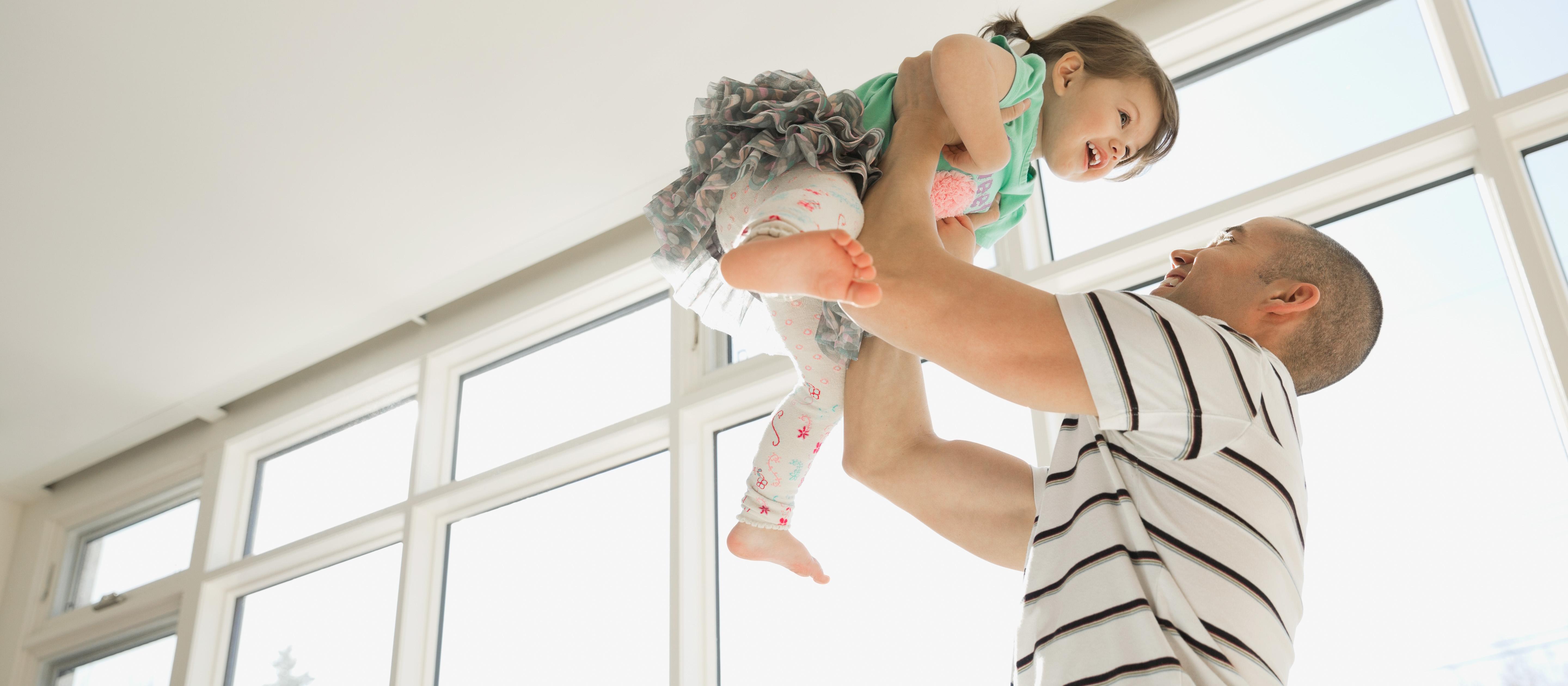 Dad and daughter playing