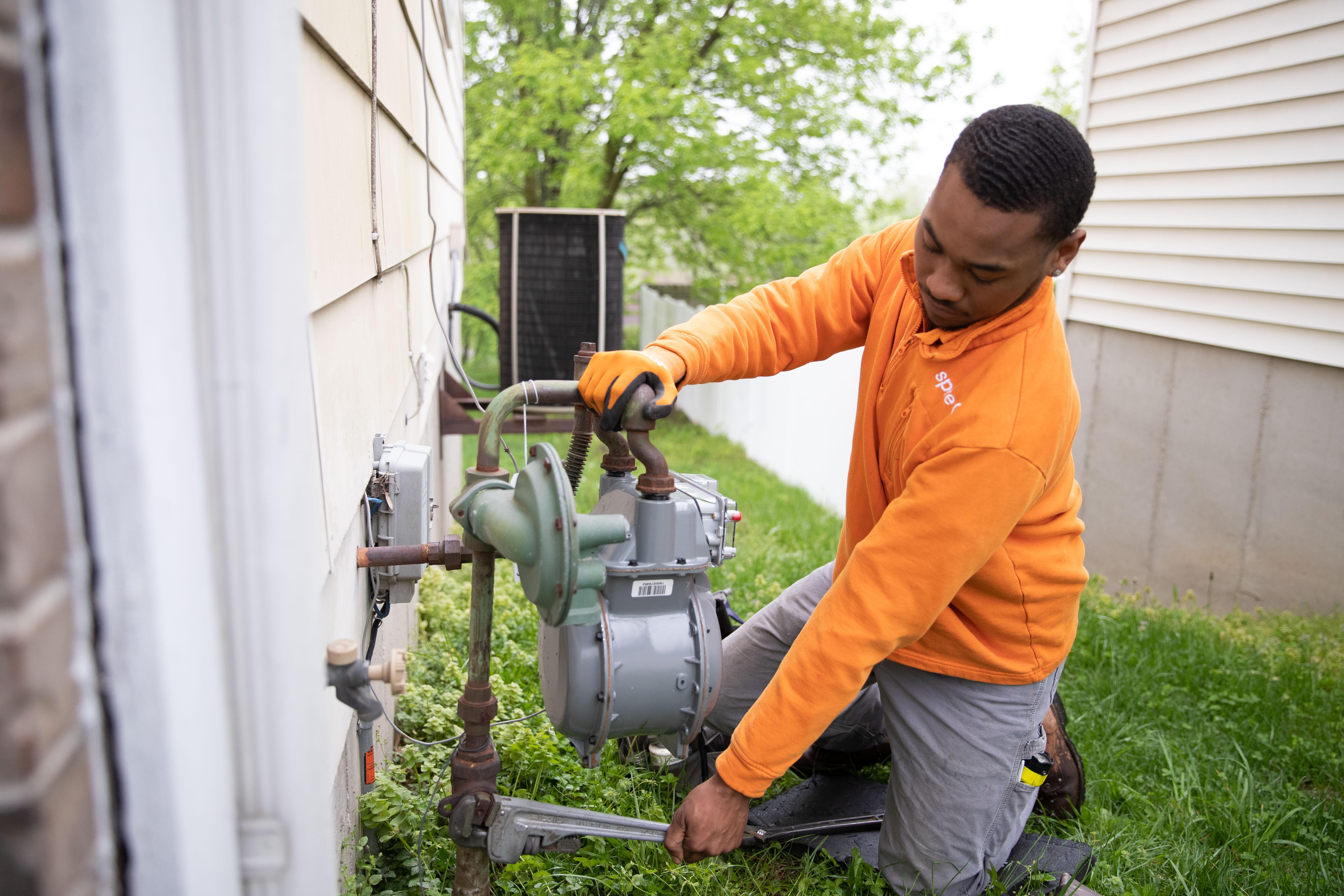 Spire employee by equipment