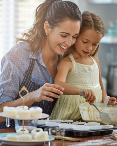 Mom and daughter baking