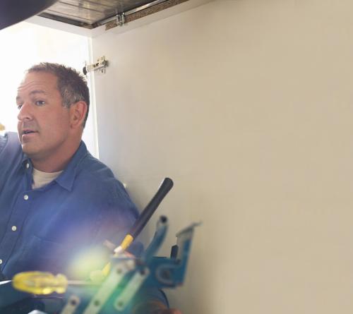 Image of: Contractor pointing to equipment